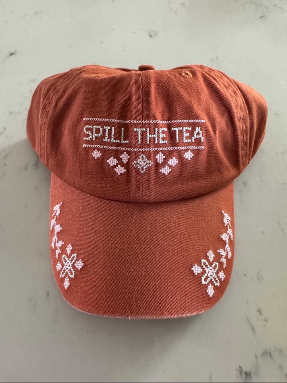 Anthropologie - Rust Embroidered 'Spill The Tea' Baseball Cap